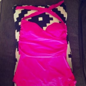 Bright pink one piece bathing suit