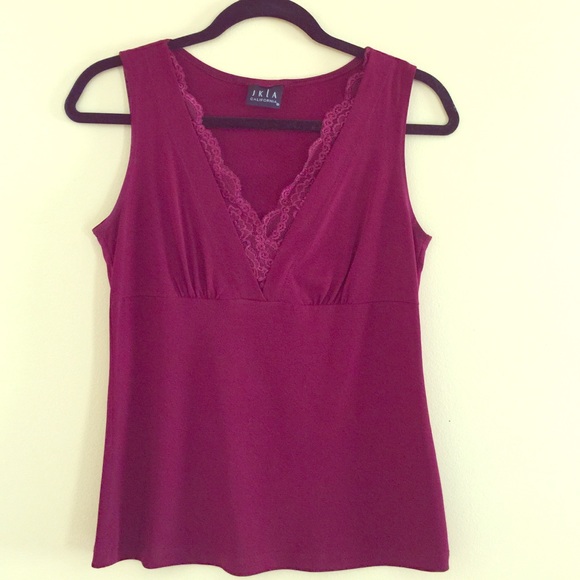 Sleeveless red with V neck shirt