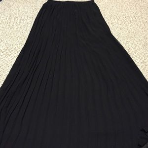 Black pleated sheer maxi skirt.