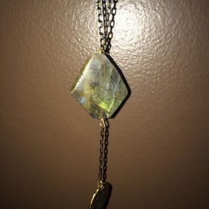 necklace with stone and charm