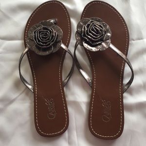 Silver flower flip flops