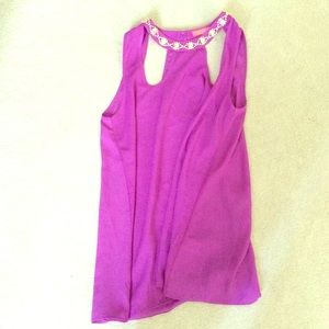 Purple sheer with embellishments around neckline