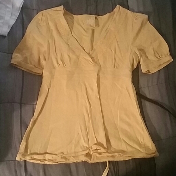 A mustard yellow top
