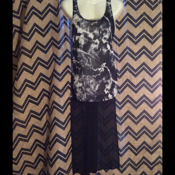 Sheer tank with longer tail