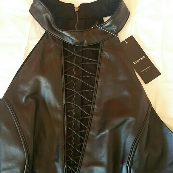 Bebe Faux Leather Lace Front Peplum Top