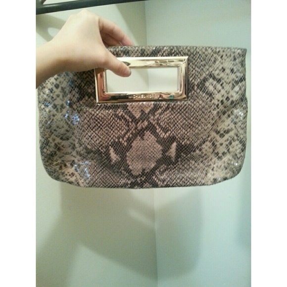 Michael Kors Handbags - Michael kors gold python print Berkeley clutch
