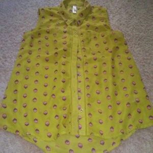 Sleeveless green and print top