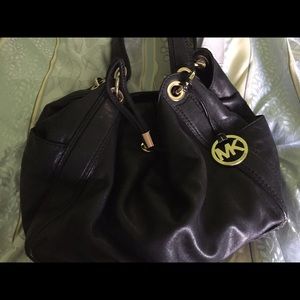 Michael Kors black leather handbag