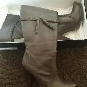 C. SANTANA BOOTS VERY VERY COMFORTABLE