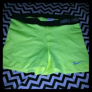 Lime color Nike Pro Dri-Fit shorts