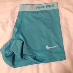 Turquoise Nike Pro spandex shorts