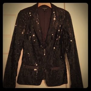 Like new. Bebe black sequins jacket.