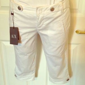 A/x short cropped white pants w silver buttons.