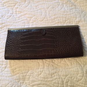 Brown leather clutch