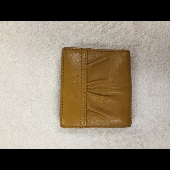 Authentic mustard yellow Coach wallet