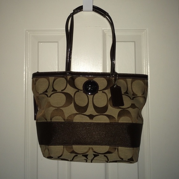 Authentic Coach tan and brown logo purse