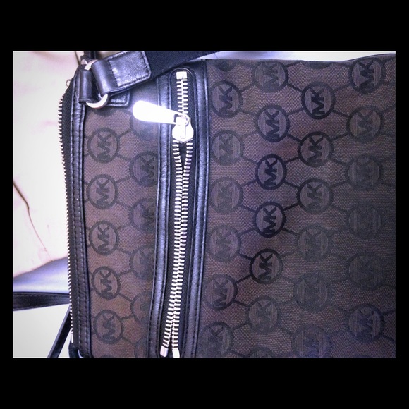 MK swing bag $60 little faded but fits a lot! - Picture 1 of 1