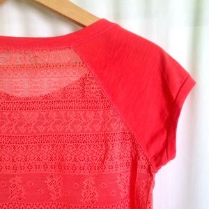 coral shirt with crocheted back