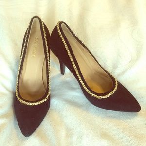 Black heels with gold chain around entire heel.