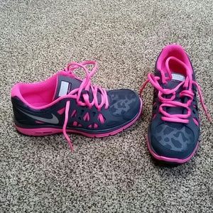 Pink and Gray Nike dual fusion