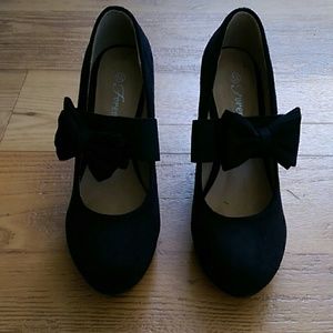 Black wedges.