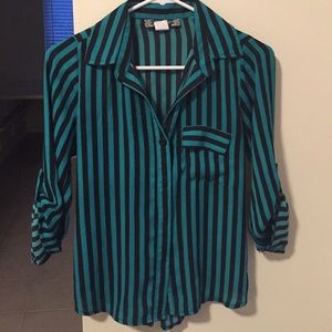 Green and black button-down blouse