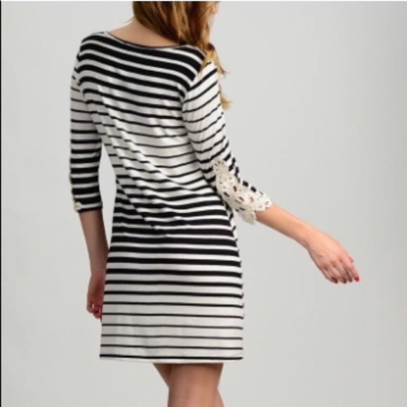 Boutique dress with lace sleeve-brand new