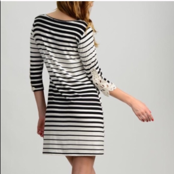 Boutique dress with lace sleeve-brand new