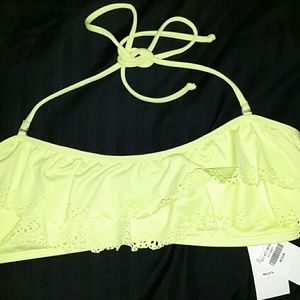 Yellow/green bathing suit top.