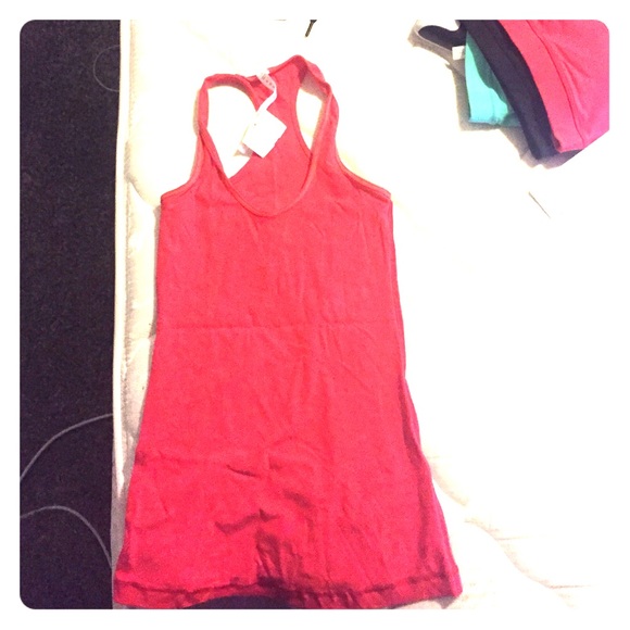 Red lululemon workout shirt. Brand new w/o tags.