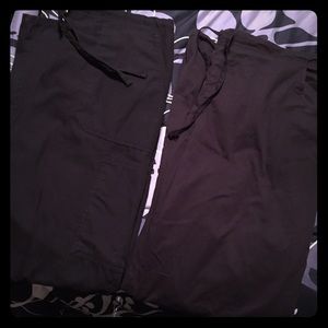 2 pairs of scrubs pants.