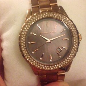 Michael Kors rose gold watch with opalescent face