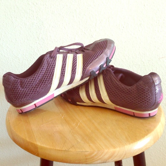 Size 9 purple Adidas running shoes. Lightly used.