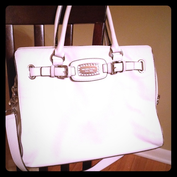 White Leather Michael Kors. Very gently used.