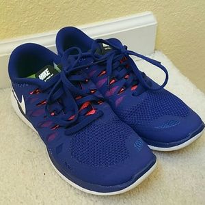Nike free 5.0 mens 6/womens 7.5