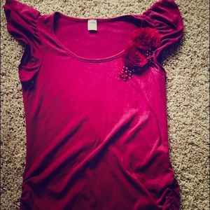 Embellished maternity top.