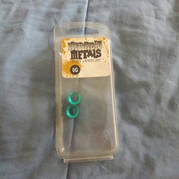 0G teal plugs