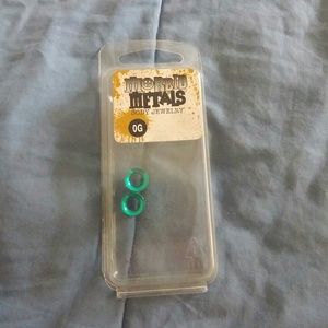 0G teal plugs
