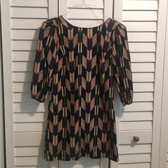 Low back, long sleeved, patterned shift dress