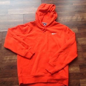 Brand new orange Nike shirt.