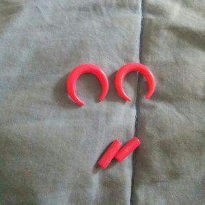Hot pink stretchers and plugs