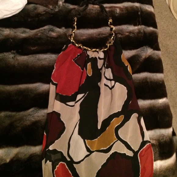 beautiful detailed tie around the neck top.