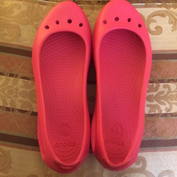 Pink brand new Croc flats