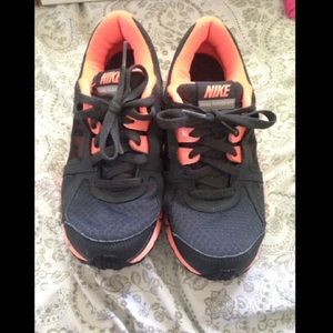 Orange Nike shoes