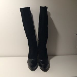 Knee high stiletto boot.