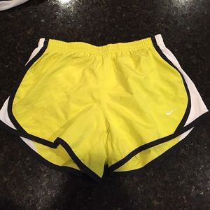 yellow Nike shorts