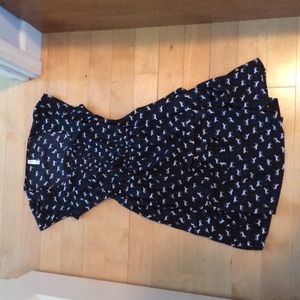 Black dress with white horses. Has pockets