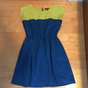 Top yellow, bottom half blue dress with zipper