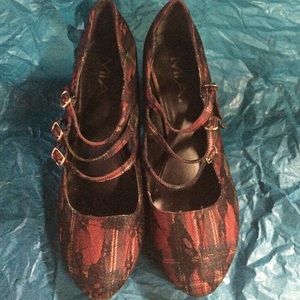 Strappy Red Pumps with a Twist