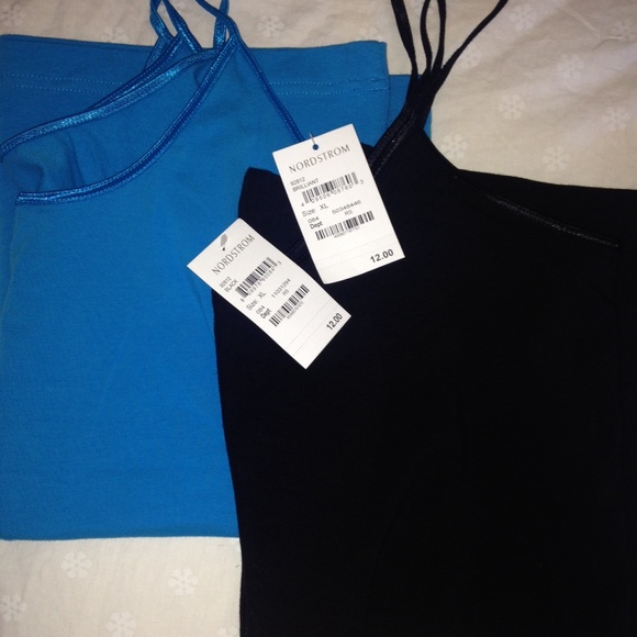 Two thin strapped tank tops